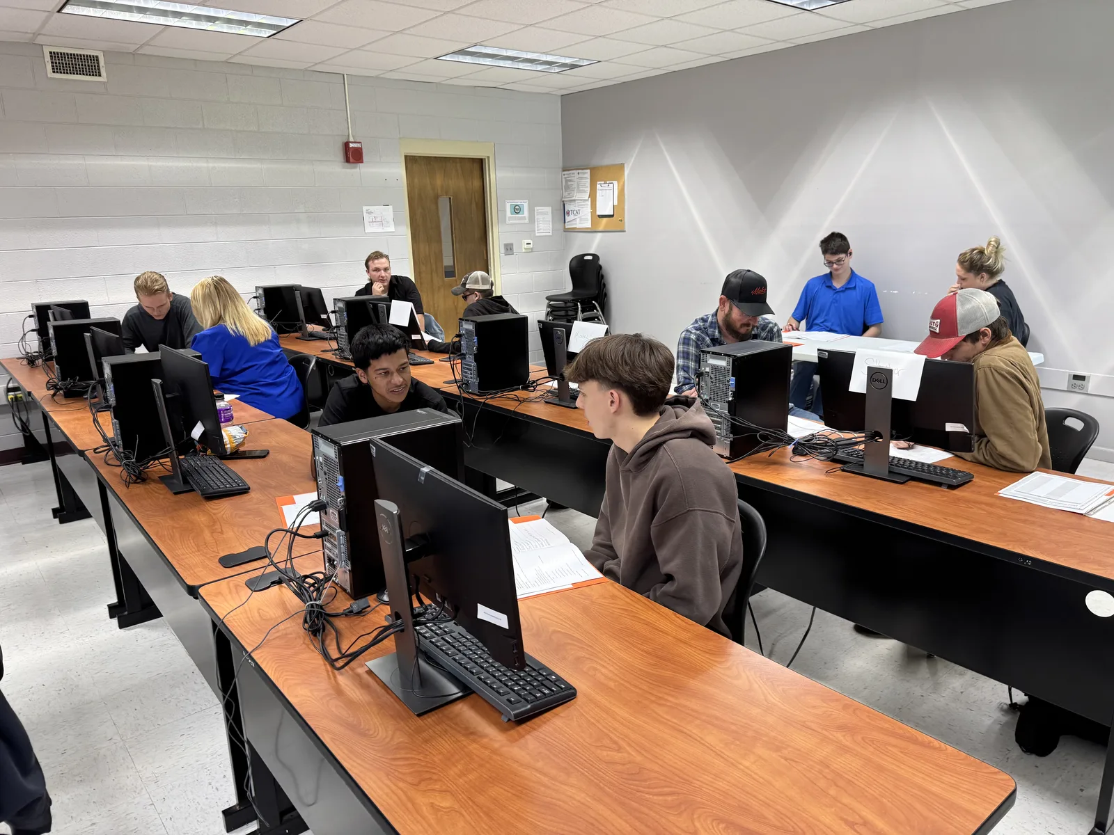 Adults working together in a Tech 4 All Tennessee classroom
