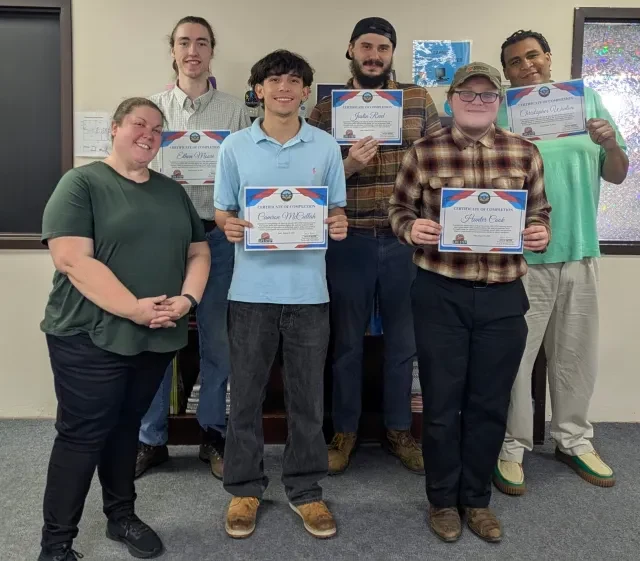 LIFE-STEP Professional graduates with their certificates of completion