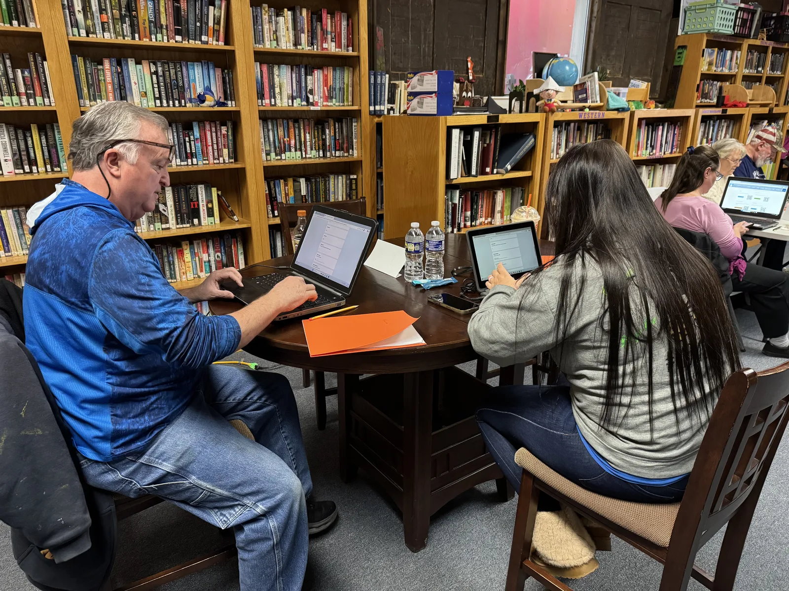 Adults learning digital skills together