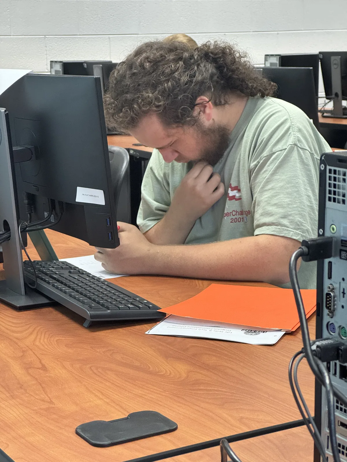 Student practicing digital skills on a computer